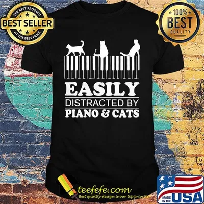 Easily distracted by piano and cats shirt