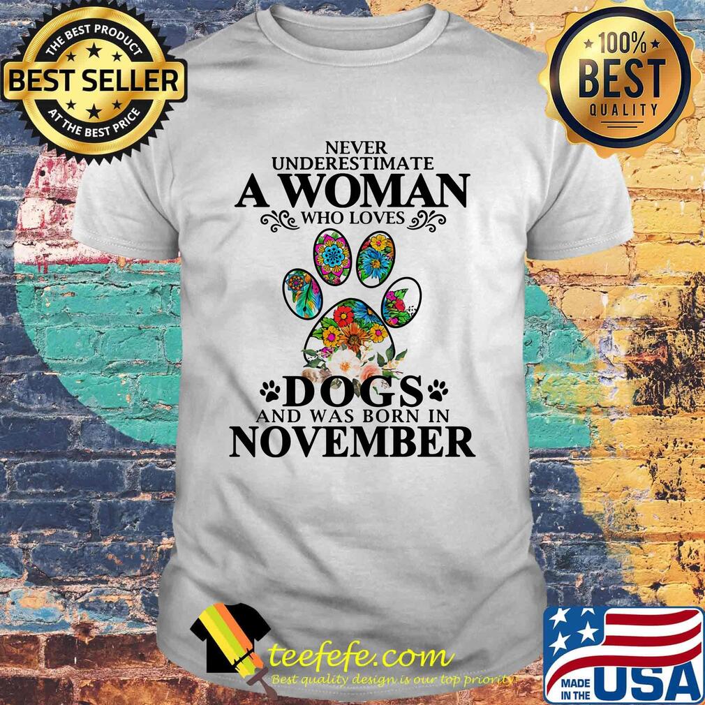 Never underestimate an old woman who loves dogs paw and was born in november shirt