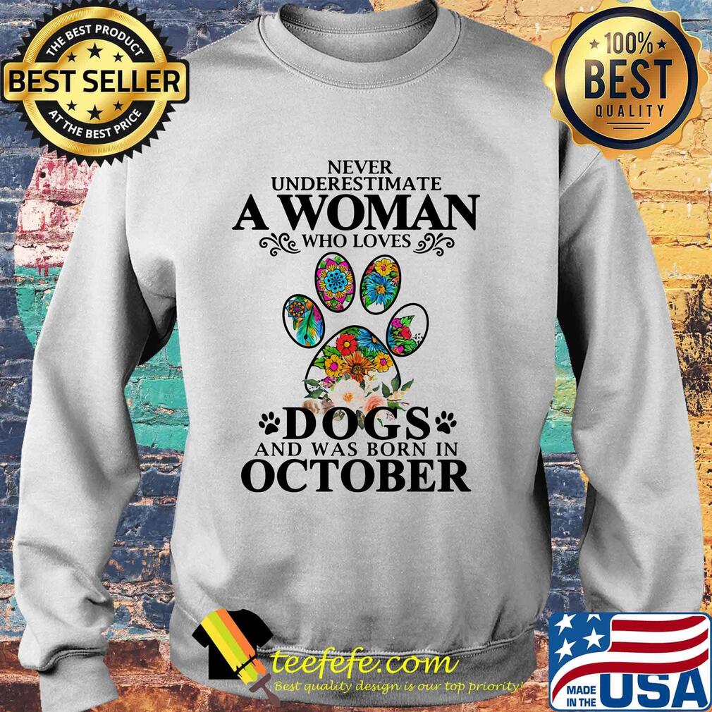 Never underestimate an old woman who loves dogs paw and was born in october s Sweater Never underestimate an old woman who loves dogs paw and was born in october s Sweater