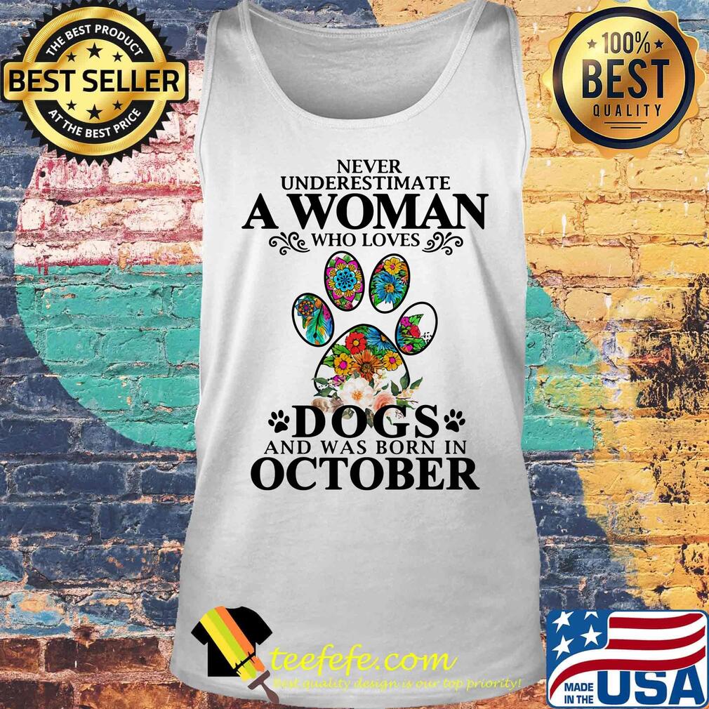 Never underestimate an old woman who loves dogs paw and was born in october s Tank top Never underestimate an old woman who loves dogs paw and was born in october s Tank top