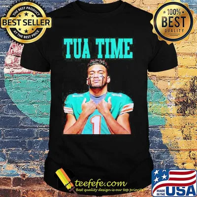 Tua in a miami dolphins team football shirt