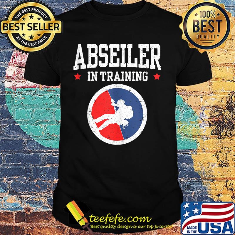Abseiler in training stars shirt