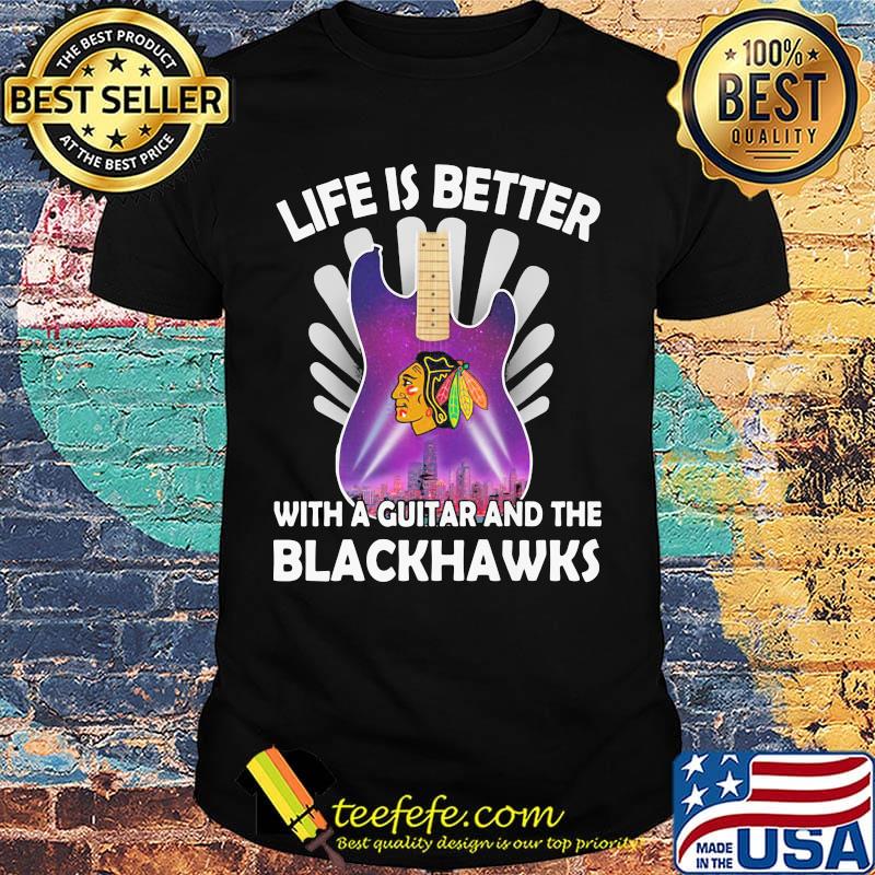 Life is better with a guitar and the blackhawks shirt
