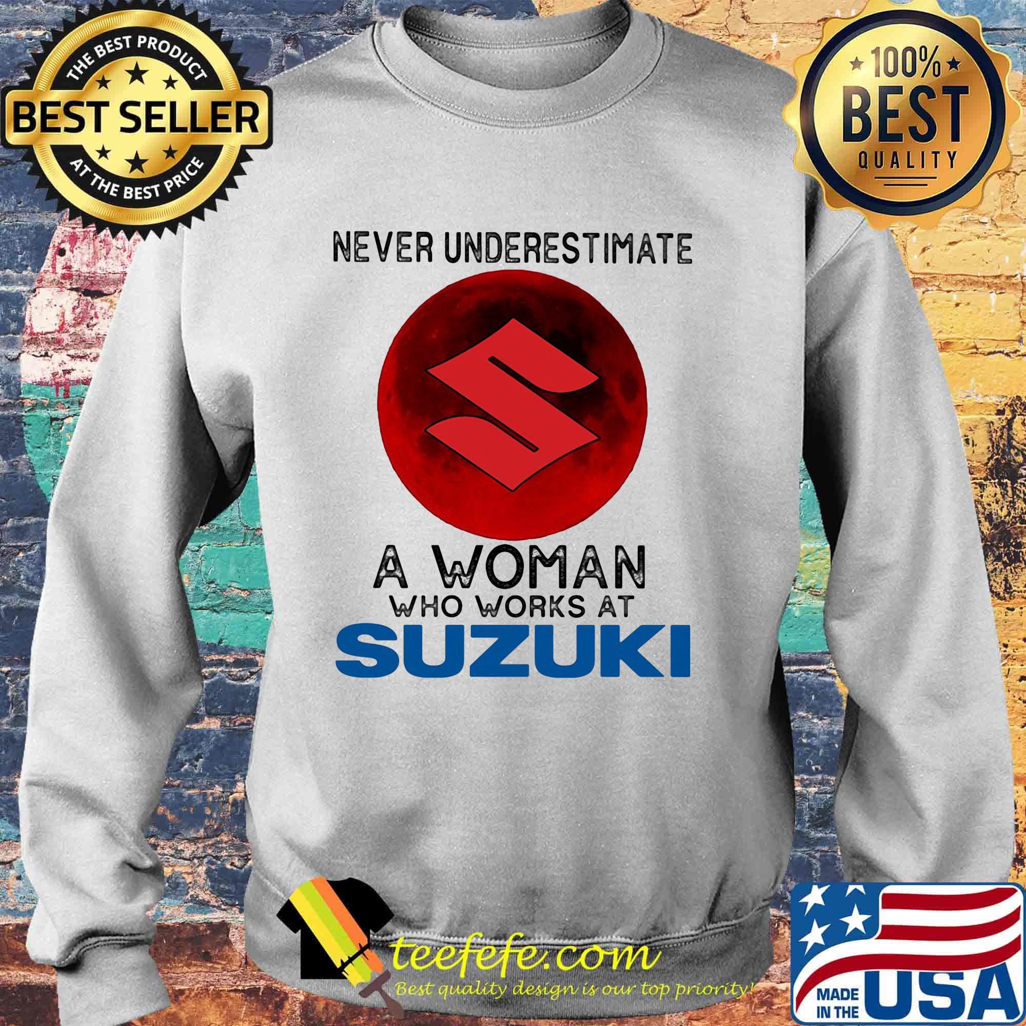 Never underestimate a woman who works at suzuki sunset s Sweater Never underestimate a woman who works at suzuki sunset s Sweater