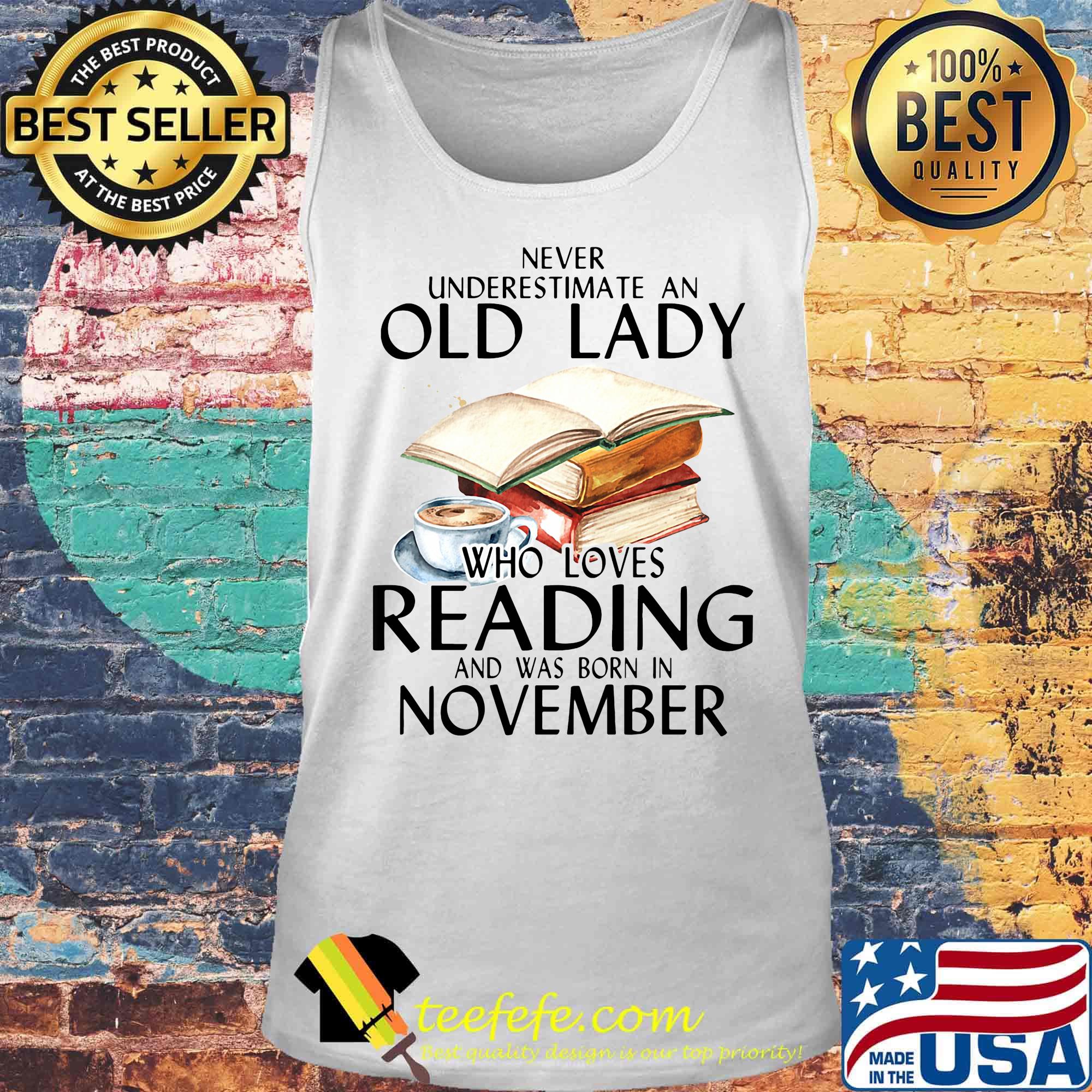 Never underestimate an old lady who loves reading and was born in november s Tank top Never underestimate an old lady who loves reading and was born in november s Tank top
