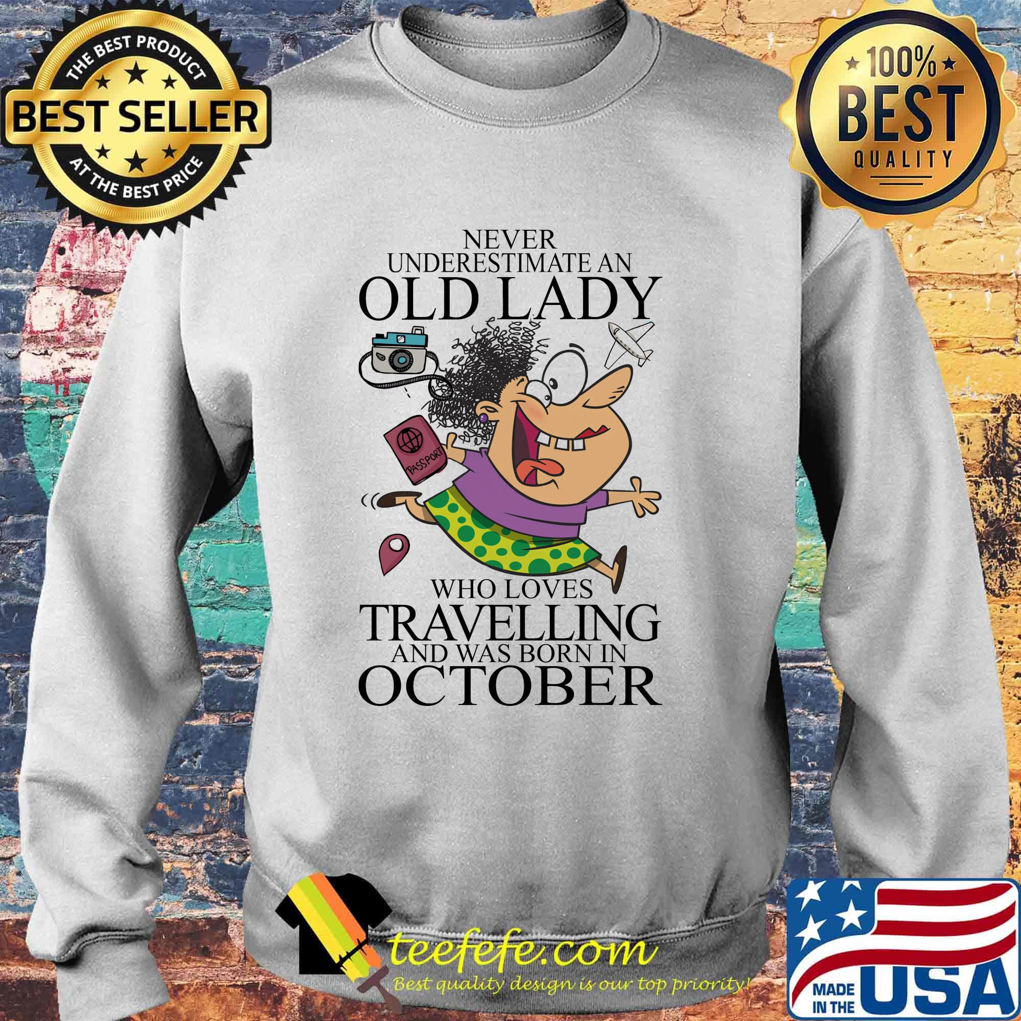 Never underestimate an old lady who loves travelling and was born in October sunset s Sweater Never underestimate an old lady who loves travelling and was born in October sunset s Sweater