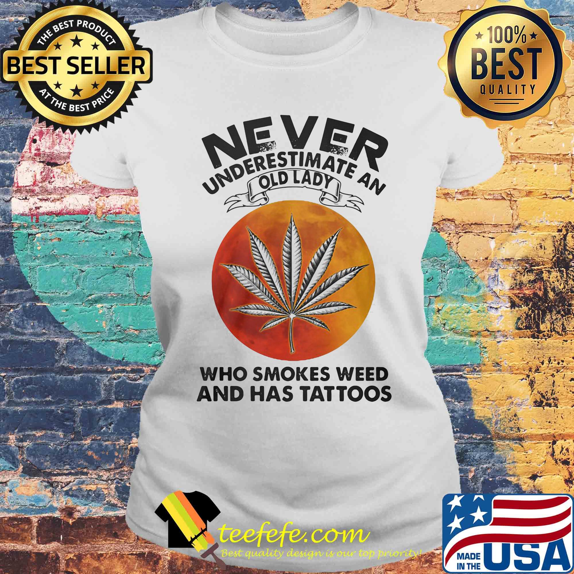 Official Never underestimate an old lady who smokes weed and has tattoos sunset s Laides tee Official Never underestimate an old lady who smokes weed and has tattoos sunset s Laides tee
