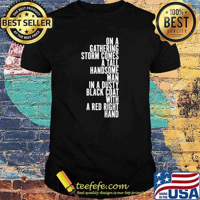 On A Gathering Storm Comes A Tall Handsome Man In A Dusty Black Coat With A Red Right Hand Quote Shirt