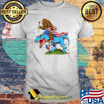 Bigfoot riding Dinosaur USA Flag 4th of July America T-Shirt
