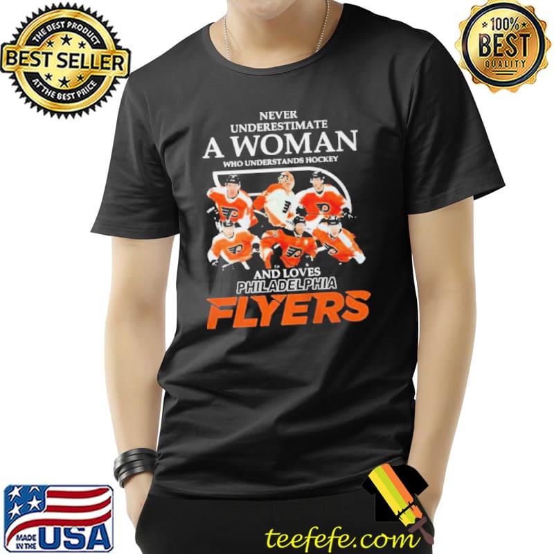 NEVER UNDERESTIMATE AN OLD WOMAN WHO UNDERSTANDS HOCKEY AND LOVES PHILADELPHIA FLYERS SHIRT Unisex NEVER UNDERESTIMATE AN OLD WOMAN WHO UNDERSTANDS HOCKEY AND LOVES PHILADELPHIA FLYERS SHIRT Unisex