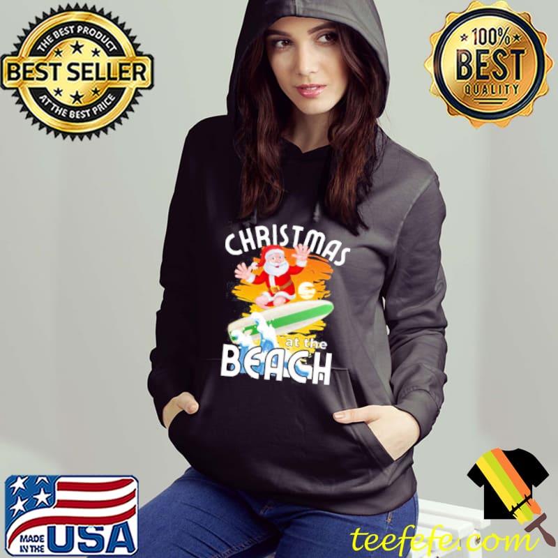 Christmas at the beach with surfing santa claus Hoodie Christmas at the beach with surfing santa claus Hoodie