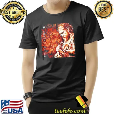 He is singing country popular and legend tyler childers shirt