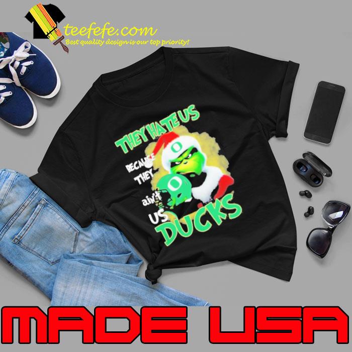 Grinch Hat Santa They Hate Us Because Ain’t Us Oregon Ducks Helmet Christmas Shirt