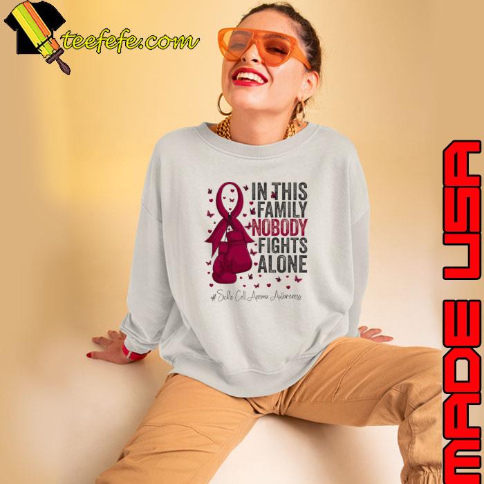 In This Family Nobody Fights Alone Burgundy Ribbon Survivor Fighter Sickle Cell Anemia Awareness T-Shirt