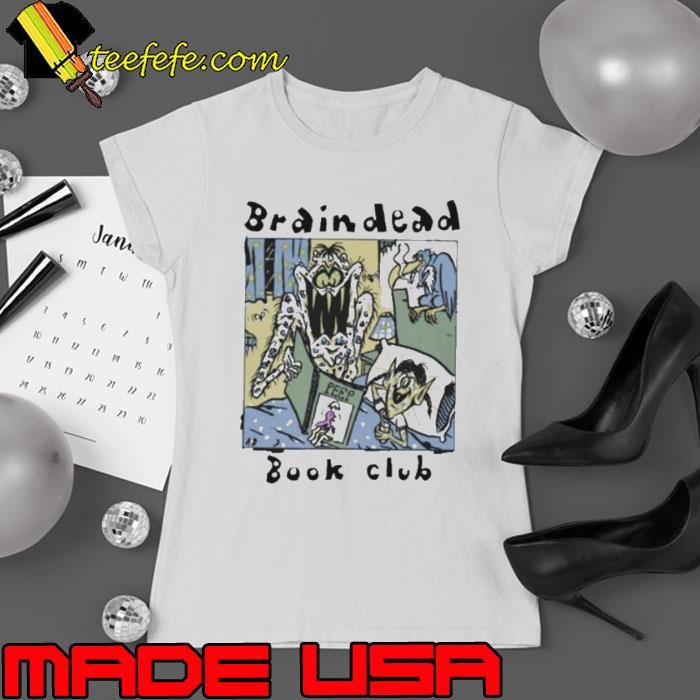 Louis Wearing Brain Dead Book Club shirt