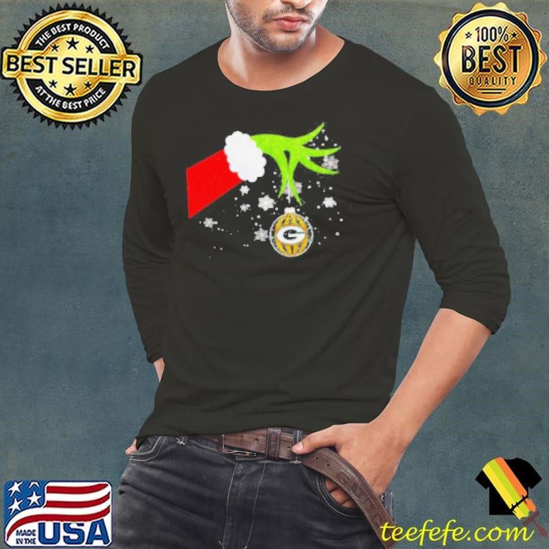 Grinch hand holding ornament Packers football Christmas shirt