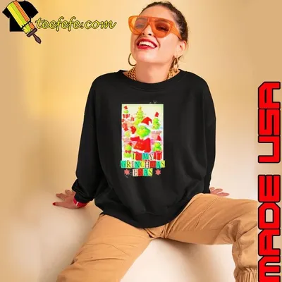 In a world full of Snoopy’s be a Grinch Christmas lights shirt
