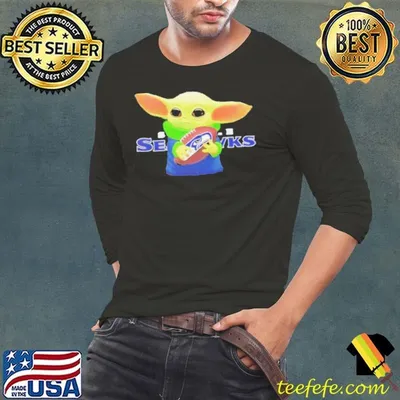 Baby Yoda holding Seattle Seahawks football shirt