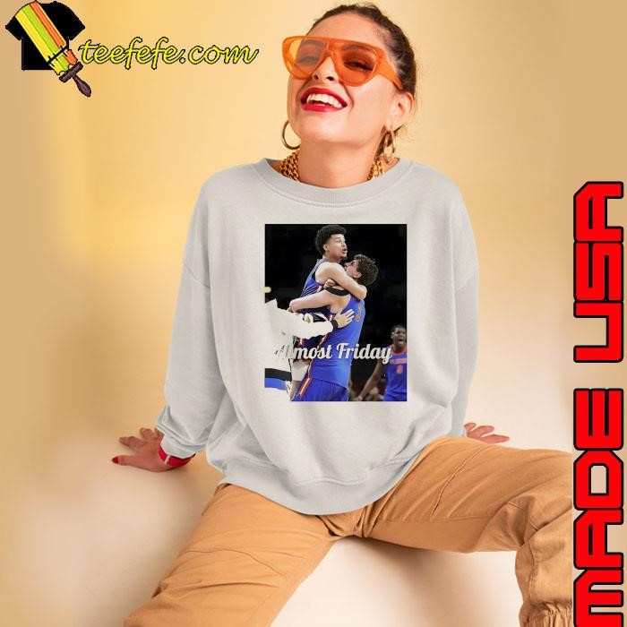 Clayton Jr. hug Micah Handlogten Almost Friday shirt
