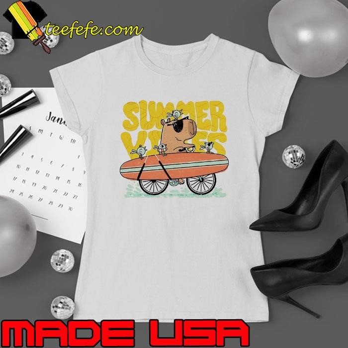 Capybara and birds on a bicycle heading to the beach with a surfboard summer vibes Ladies tee
